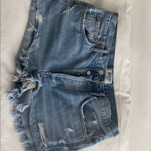 AGolde Parker vintage cutoff shorts in Swapmeet.